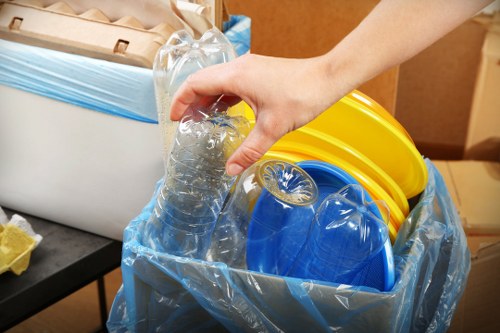 Variety of office items being sorted for clearance