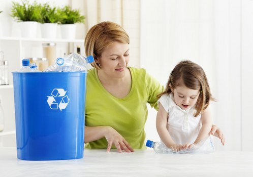 Workers loading segregated recyclables during an office clearance